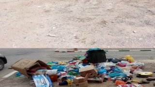 بالصور: تنظيف شارع ملوية من الأزبال